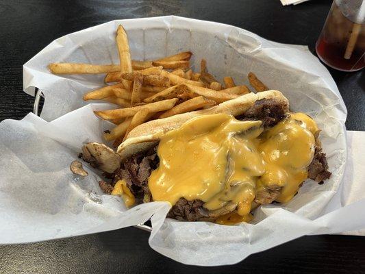 Philly Cheese Steak with French fries. Very very filling and delicious.