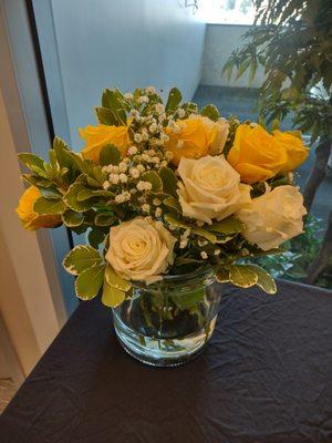 Bouquet 1: Arranged (by me) in glass containers for our office event.