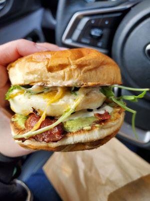 Brioche, egg, sauce, cheddar, bacon, avocado, arugula