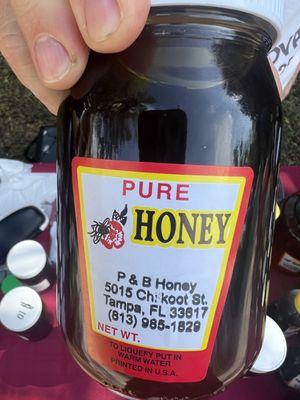 A nice gentleman sells his pure local honey