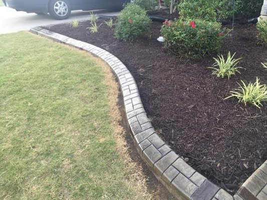 Continuous Concrete Curbing is the only permanent solution for landscape edging.