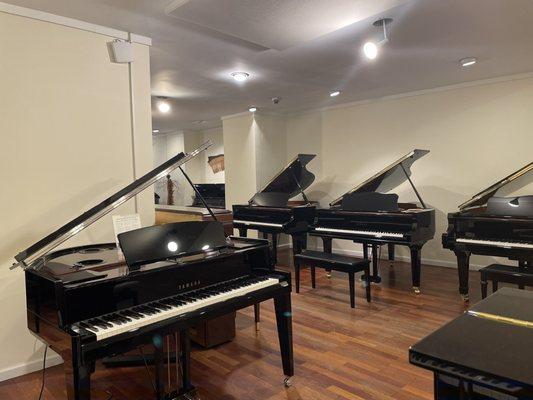 Main show room with the grand pianos