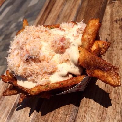 Beer battered garlic fries topped with homemade crab aioli and snow crab