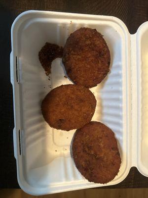 Clam cakes and my lobster roll on top of the onion rings. They gave me as you can see. The lobster roll fell apart.