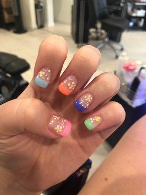 Full set colored French tips with flower designs