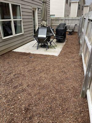 Backyard with "Yard Kid-Safe Playground mulch