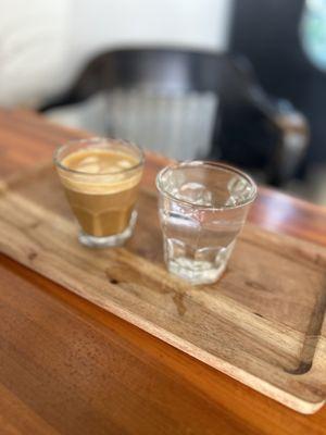 Cortado and sparkling water ! Just like how it may be served in Italy :-)