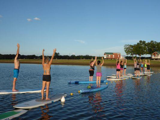 SUP Yoga classes on Lake Grapevine:  https://dfwsurf.com/paddleboard-yoga-dallas/