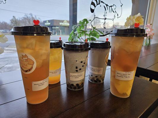 Wintermelon tea, mango green tea, taro slush, taro milk green tea, and winter melon with pudding