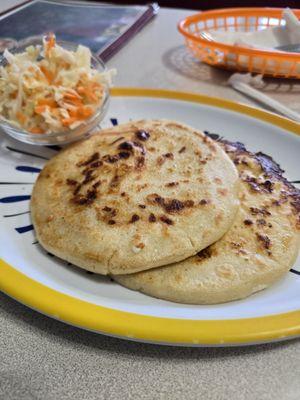 2 pupusas and cabbage slaw