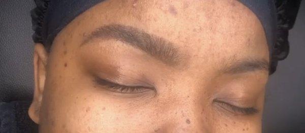 Eyebrow wax and fill in.