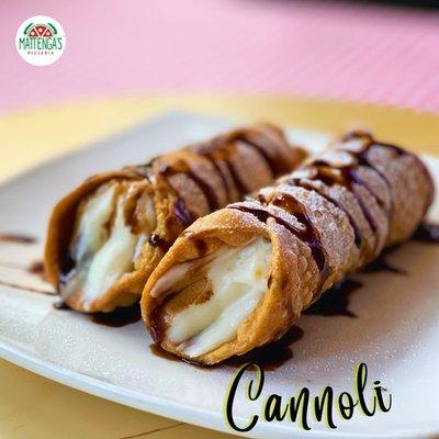 Two Cannoli shells filled with sweet
Ricotta cream and Chocolate chips. Yum!