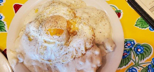 Biscuits and gravy with 2 over easy eggs. Delicious!