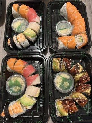 Two Rainbow rolls, Washington roll (salmon) and Eel roll.