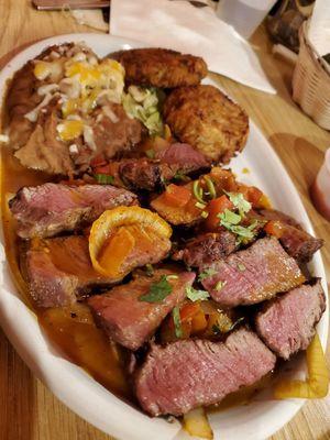 Steak with beans and Mexican potato pancakes