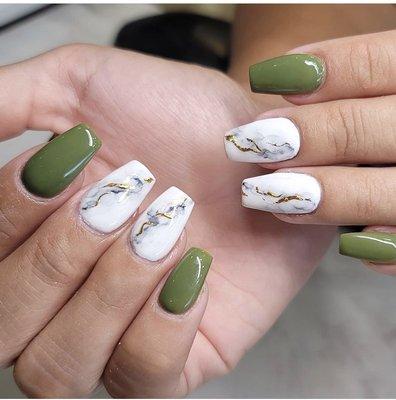 Another great visit with Tiffany. Dip powder on natural nails with some marble art.