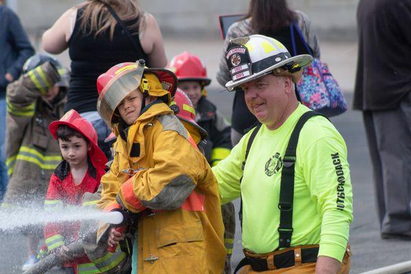 The FASNY Museum of Firefighting offers FREE monthly programs and events for families to enjoy. Pictured: Water Wars!