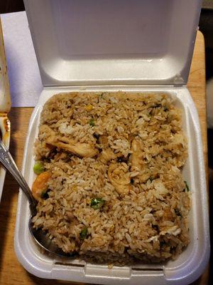 House fried rice with chicken, beef and shrimp.