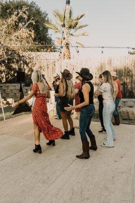 Guests line dancing!