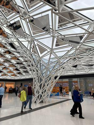 "Common Sky" a stunning new sculpture centerpiece inside the Knox Building's Town Square, a community gathering space.