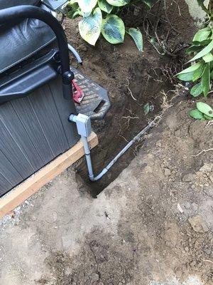 Hot tub electrical installation. Trenched over to the hot tub to get the least amount of exposed conduit.