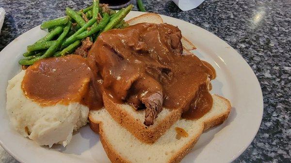 Open faced beef sandwich