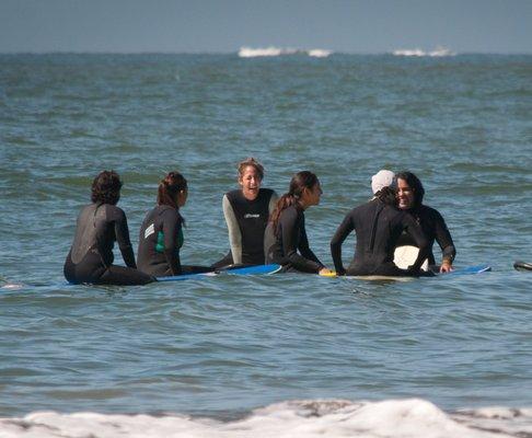 Leading a group coaching circle on the water for women leaders.