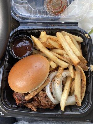 BBQ Pulled pork with pickle, onion, and side fries