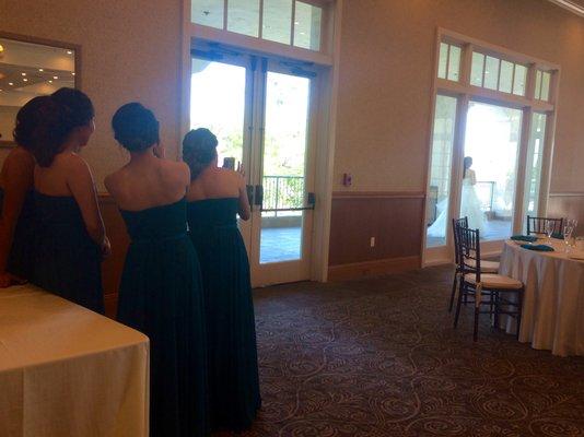 A favorite moment...the bridesmaids spying on the first look!