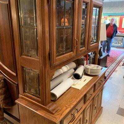 Cabinet with glass panes in them.