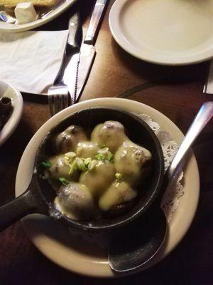 Stuffed mushrooms. Not to our taste. We did not care for them. Our waiter was very attentive. We did not ask but he took them off our bill.