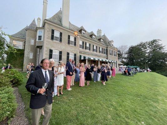 Members and guests standing proud during the "colors" ceremony when the club lowers the American flag each night. #tradition #honor