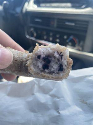 So many blueberries in the blueberry donut