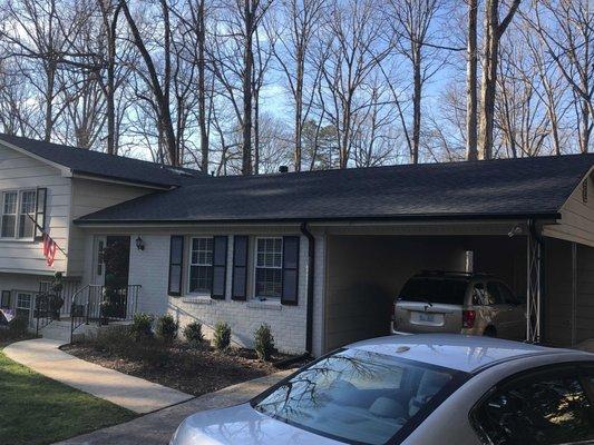 Brand new 5" black, seamless gutters with Shur-Flow guards,is the finish touch to this Moire Black CertainTeed 50 year warranted roof!