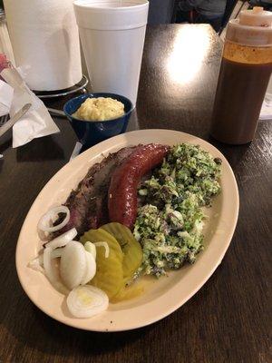 Brisket plate with added sausage, broccoli slaw and potato salad