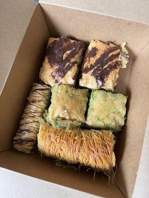 $20 worth of Baklava (a rich, sweet pastry made of layers of filo dough filled with chopped nuts and sweetened with syrup or honey.)