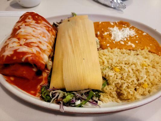 Combination plate with mini chimi, corn tamale, rice, and beans.  Just under $20.