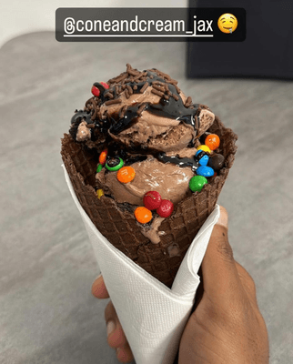 Chocolate waffle cone
Chocolate Ice Cream
M&M's and Hershey's syrup.