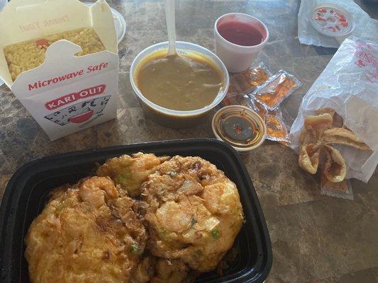 Shrimp Egg Fu Young w/gravy and fried rice. A side of crab rangoon w/sweet and sour sauce.