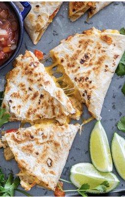 Quesadillas special - make it any way you like ! Grilled chicken , avocado , any cheese - hot off the grill !