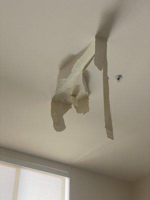 giant hole in ceiling from leak (left from april-september)