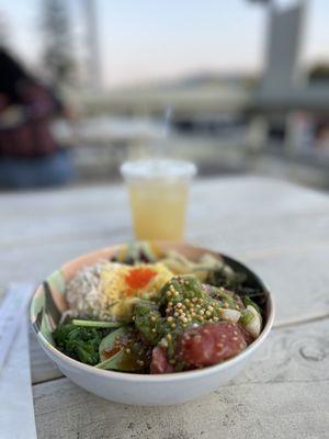 Ahí tuna poke bowl and ginger ale on the patio