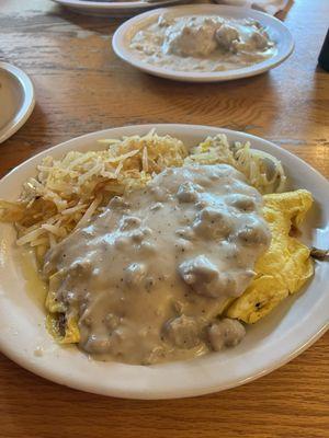 Garrett's Omelette. Good food, good breakfast prices. However, waiting for H L MIKE.... We miss him tremendously.