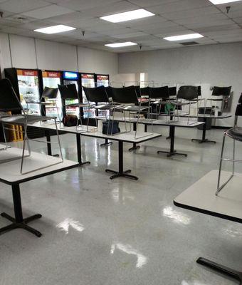 cleaning cafeteria dining area in break room