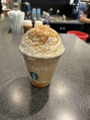 My son's favorite; the caramel ribbon crunch Frappuccino with a caramel sauce layer, and whipped cream.   It also includes caramel crumbs.