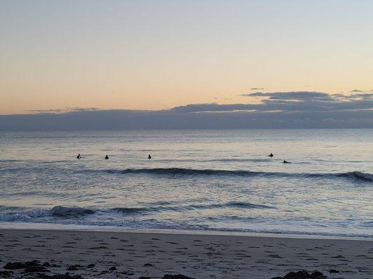 Surfers lined up for the next big wave