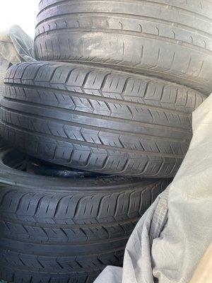 Two of the purchased tires and one of the old ones for home use.