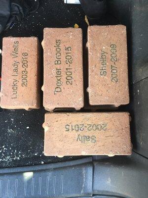 Engraved clay bricks for pet memorial