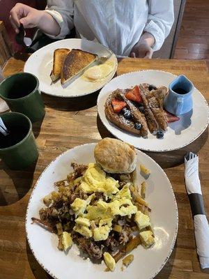 Carnitas diner Diner Hash and Eggs. Brioche French Toast with a side of over east eggs and toast.