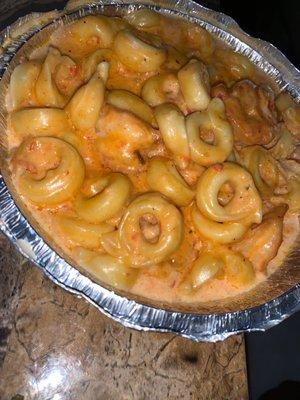 Cheese tortellini in vodka sauce with shrimp